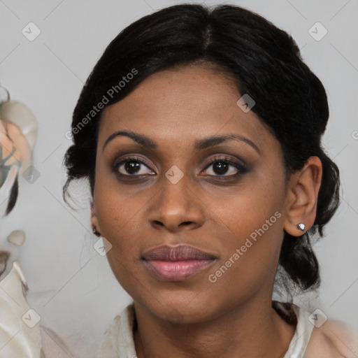 Joyful black young-adult female with medium  brown hair and brown eyes