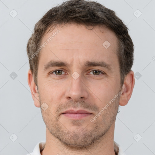 Neutral white adult male with short  brown hair and brown eyes