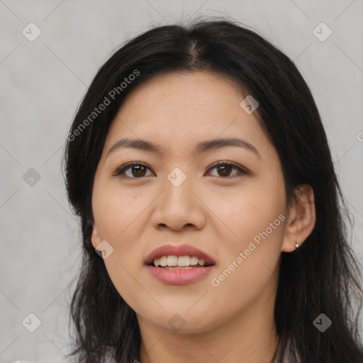 Joyful asian young-adult female with long  brown hair and brown eyes