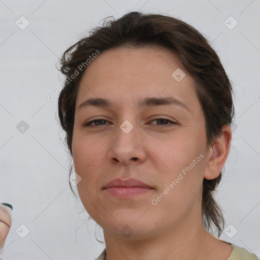 Neutral white young-adult female with medium  brown hair and brown eyes