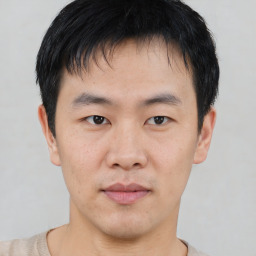 Neutral asian young-adult male with short  black hair and brown eyes