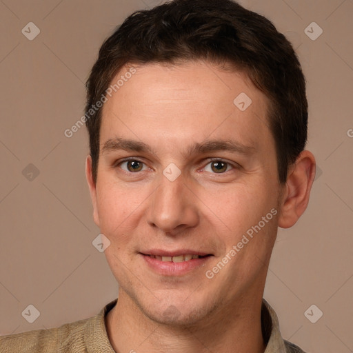 Joyful white young-adult male with short  brown hair and brown eyes