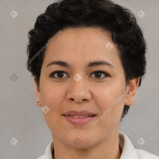 Joyful latino young-adult female with short  brown hair and brown eyes