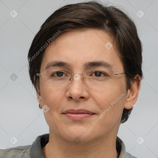 Joyful white adult female with short  brown hair and brown eyes