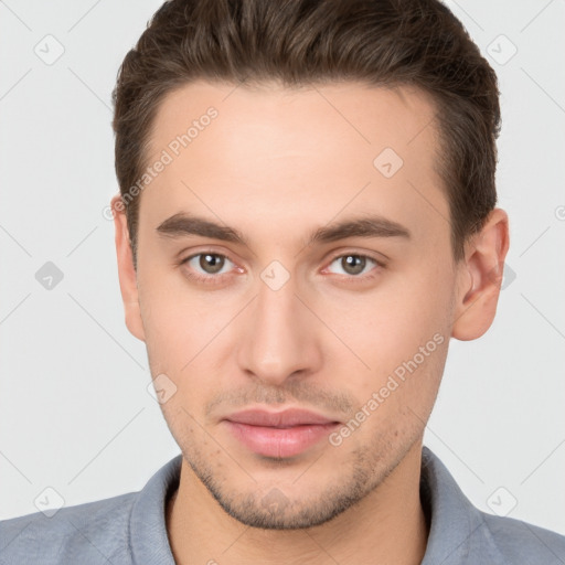 Neutral white young-adult male with short  brown hair and brown eyes