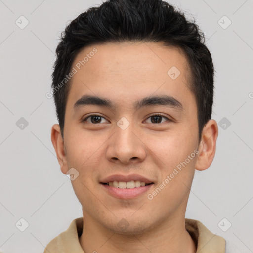 Joyful asian young-adult male with short  brown hair and brown eyes