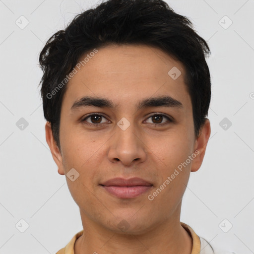 Joyful latino young-adult male with short  black hair and brown eyes