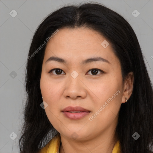 Joyful asian young-adult female with long  brown hair and brown eyes