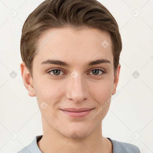 Joyful white young-adult female with short  brown hair and grey eyes