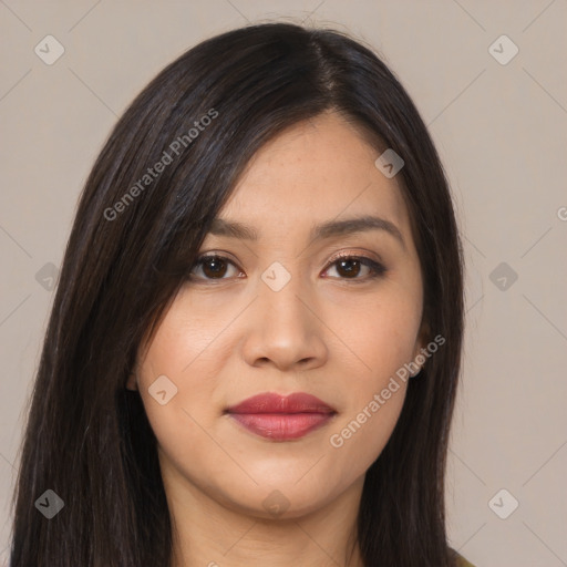 Joyful asian young-adult female with long  brown hair and brown eyes