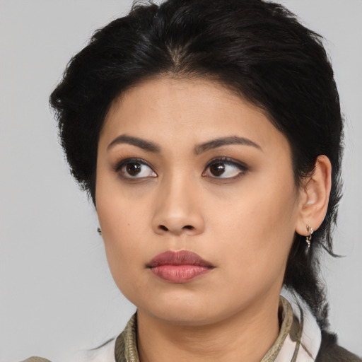 Neutral asian young-adult female with medium  black hair and brown eyes