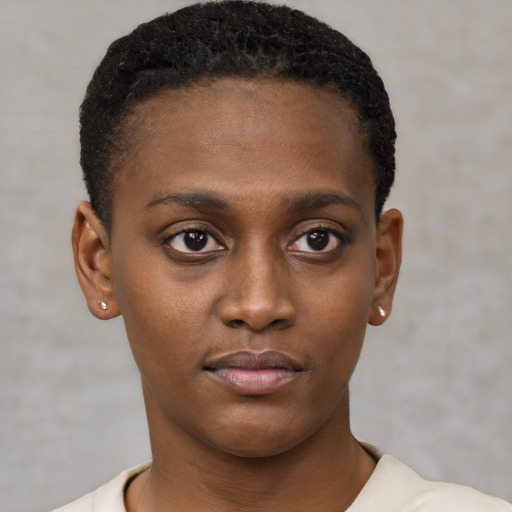 Neutral black young-adult female with short  brown hair and brown eyes