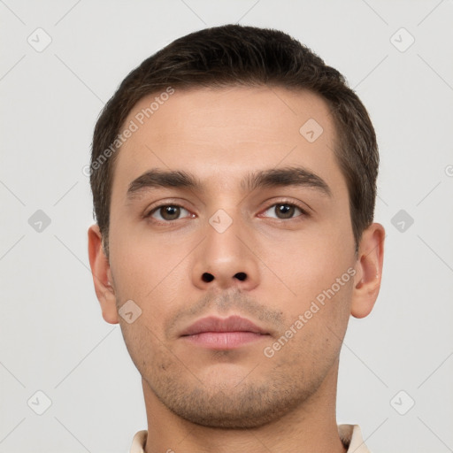 Neutral white young-adult male with short  brown hair and brown eyes