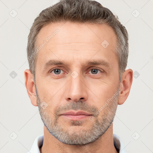 Neutral white adult male with short  brown hair and brown eyes