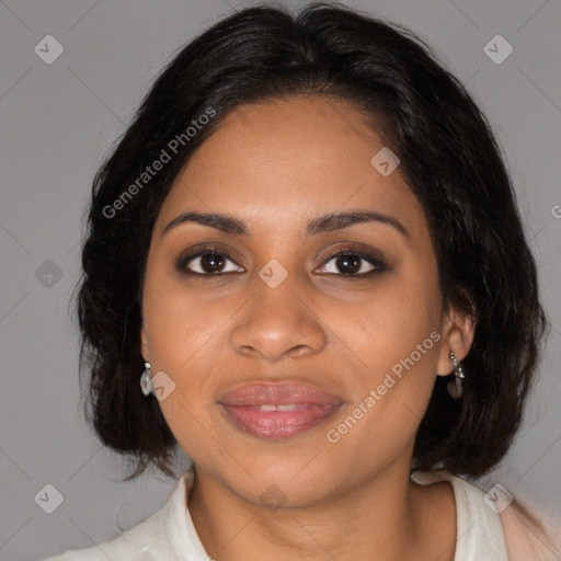 Joyful black young-adult female with medium  brown hair and brown eyes