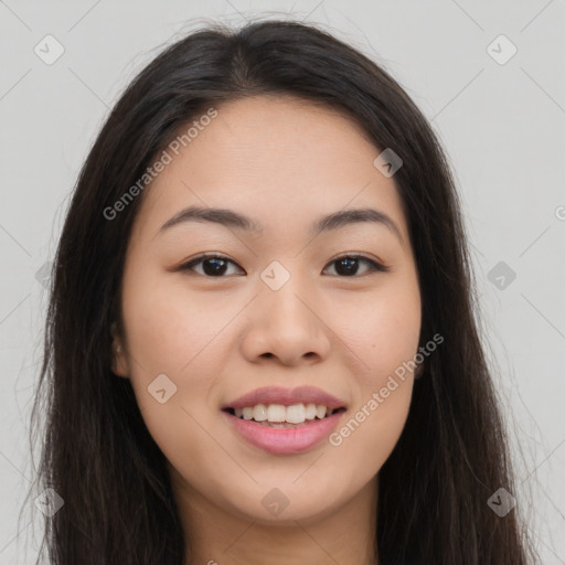 Joyful asian young-adult female with long  brown hair and brown eyes