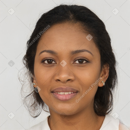 Joyful black young-adult female with medium  brown hair and brown eyes