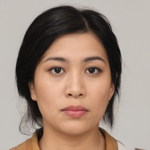 Neutral asian young-adult female with medium  black hair and brown eyes