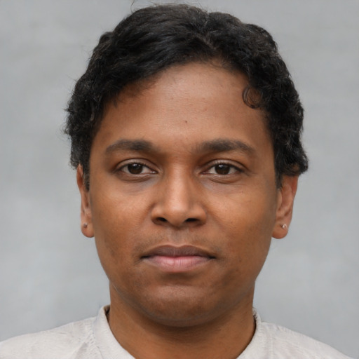 Neutral black young-adult male with short  brown hair and brown eyes