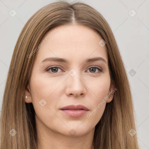 Neutral white young-adult female with long  brown hair and brown eyes