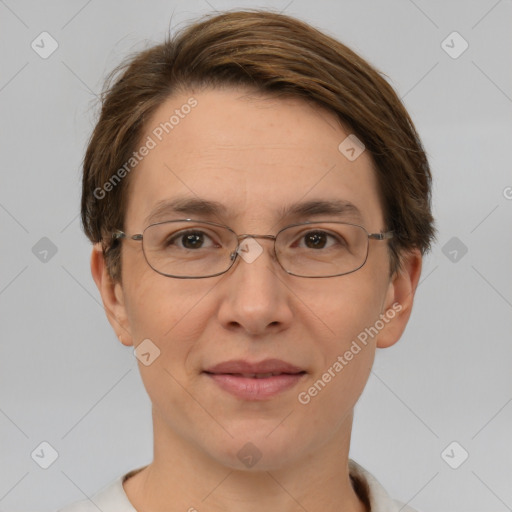 Joyful white adult female with short  brown hair and brown eyes