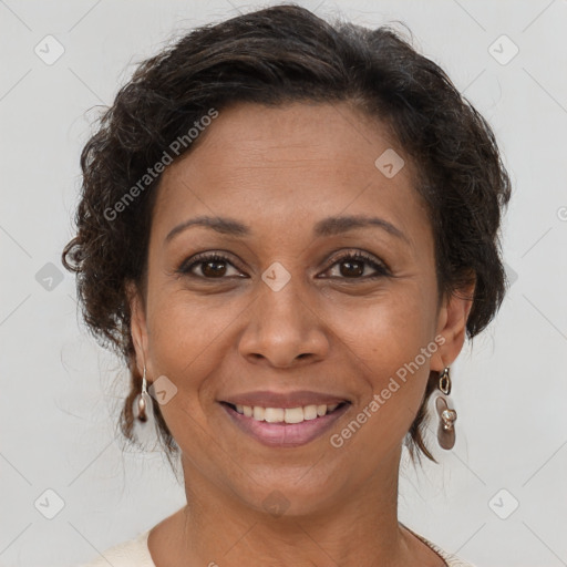 Joyful white adult female with short  brown hair and brown eyes