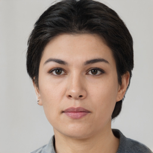 Neutral asian young-adult female with short  black hair and brown eyes