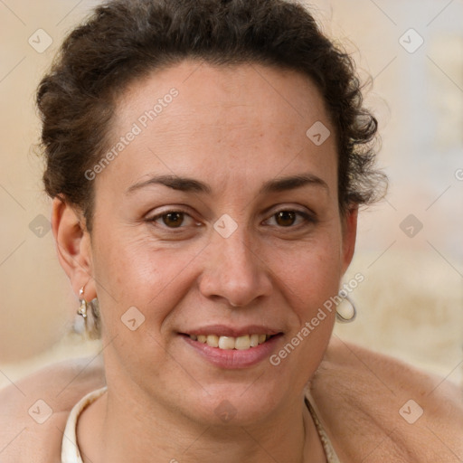 Joyful white adult female with short  brown hair and brown eyes