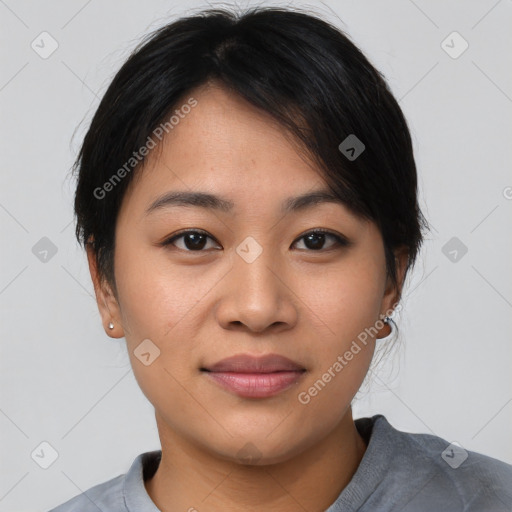 Joyful asian young-adult female with medium  black hair and brown eyes