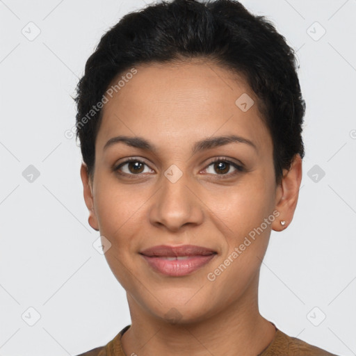 Joyful latino young-adult female with short  brown hair and brown eyes