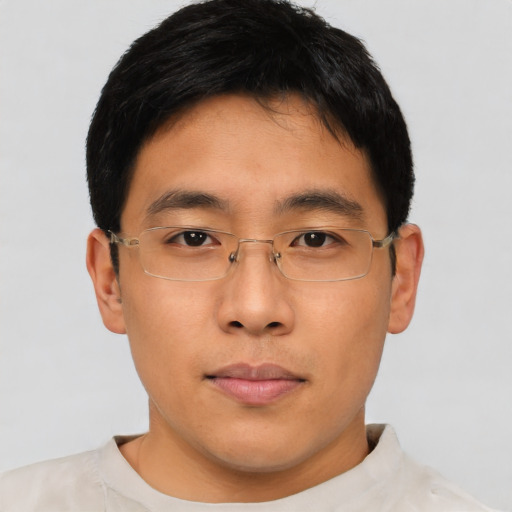 Neutral asian young-adult male with short  brown hair and brown eyes