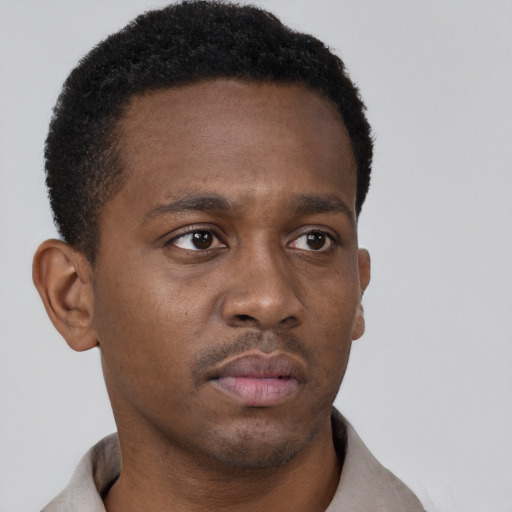 Neutral black young-adult male with short  brown hair and brown eyes