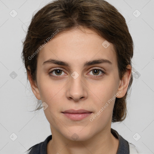 Joyful white young-adult female with medium  brown hair and green eyes