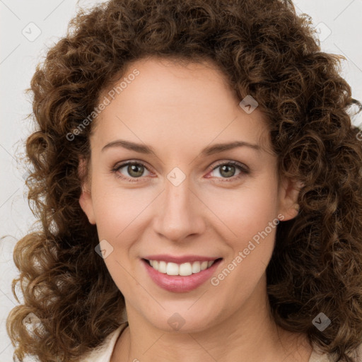 Joyful white young-adult female with medium  brown hair and green eyes