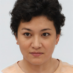 Joyful asian young-adult female with short  brown hair and brown eyes