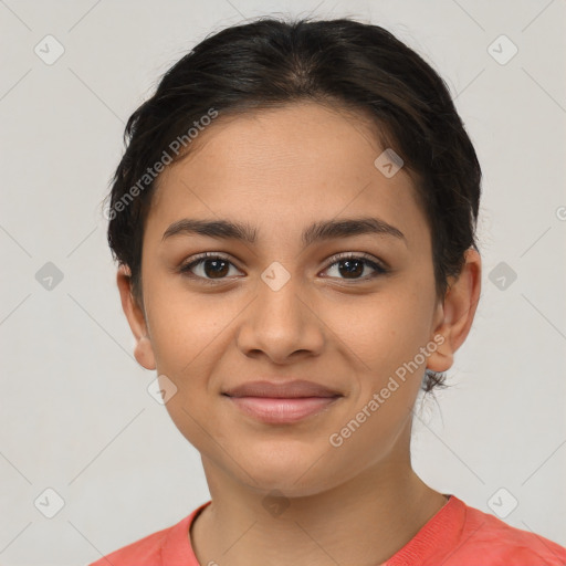 Joyful latino young-adult female with short  brown hair and brown eyes