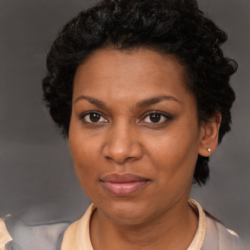 Neutral black young-adult female with short  brown hair and brown eyes