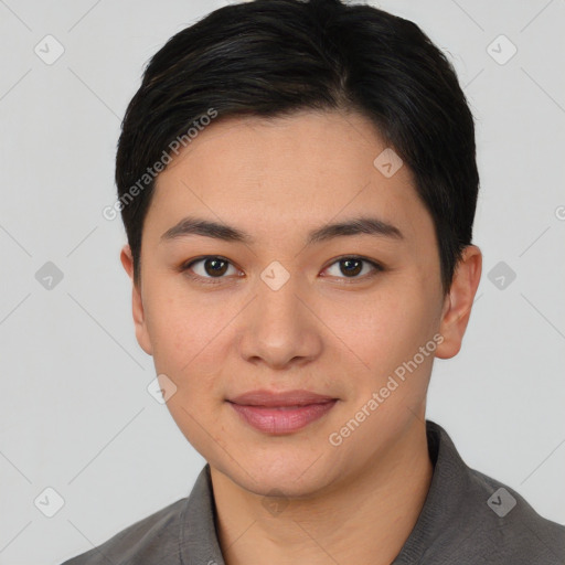 Joyful asian young-adult female with short  black hair and brown eyes