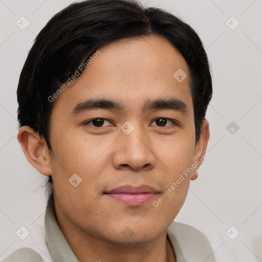 Joyful latino young-adult male with short  brown hair and brown eyes