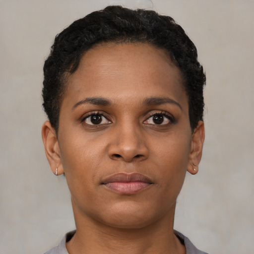 Neutral black young-adult female with short  black hair and brown eyes