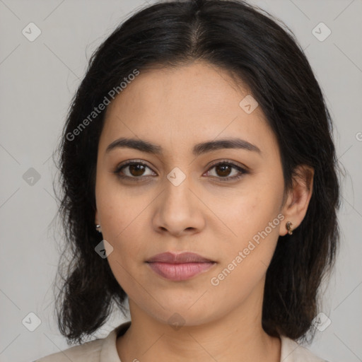 Joyful latino young-adult female with medium  black hair and brown eyes