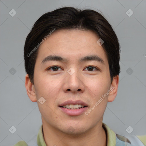 Joyful asian young-adult male with short  brown hair and brown eyes