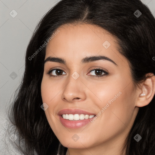 Joyful white young-adult female with long  black hair and brown eyes