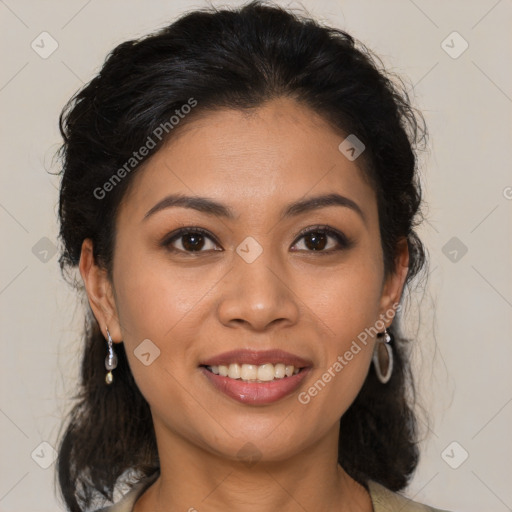 Joyful latino young-adult female with medium  brown hair and brown eyes