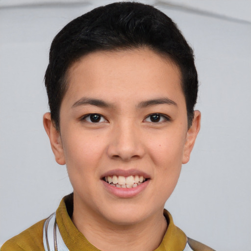 Joyful asian young-adult female with short  brown hair and brown eyes