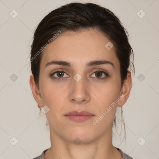 Neutral white young-adult female with medium  brown hair and brown eyes