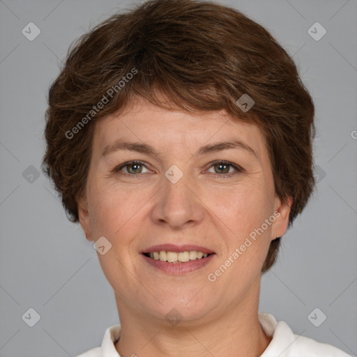 Joyful white adult female with short  brown hair and brown eyes