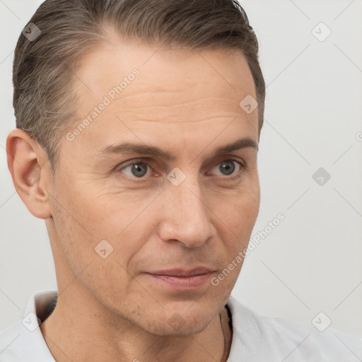 Neutral white adult male with short  brown hair and brown eyes