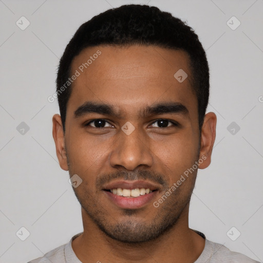 Joyful black young-adult male with short  black hair and brown eyes