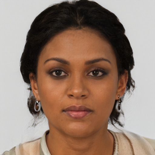 Neutral black young-adult female with medium  black hair and brown eyes